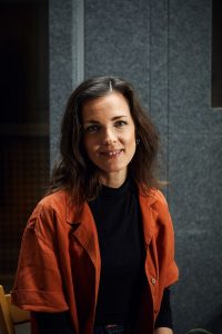 singing teacher looking at camera for a headshot