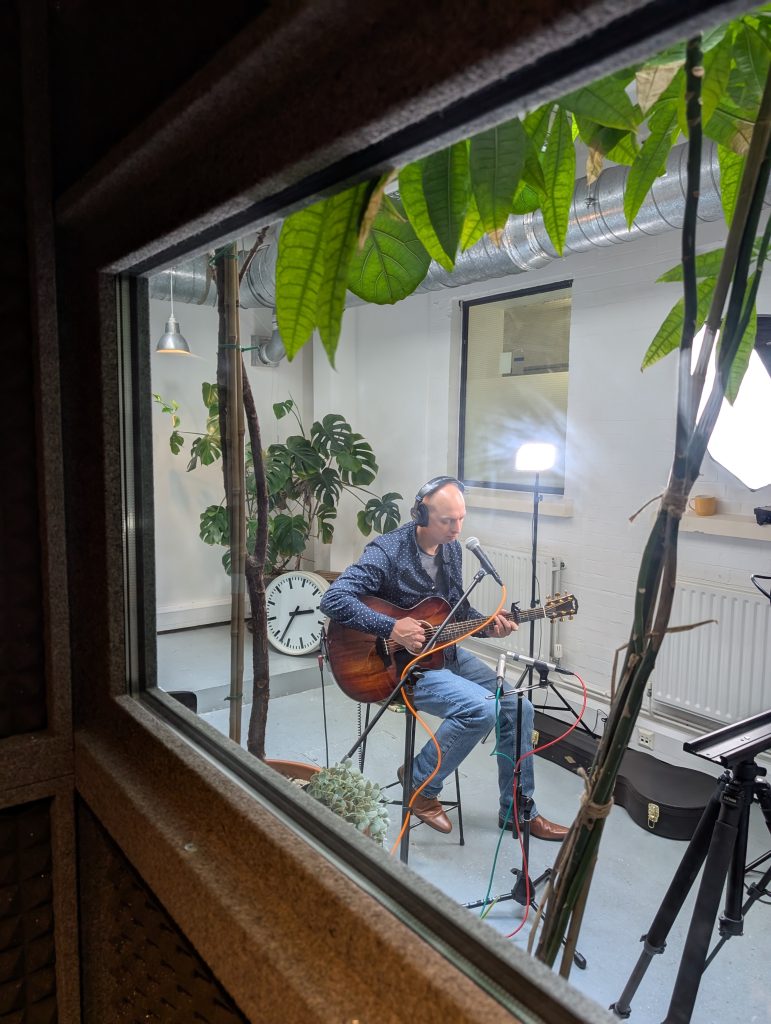 recording-studio-man-with-guitar