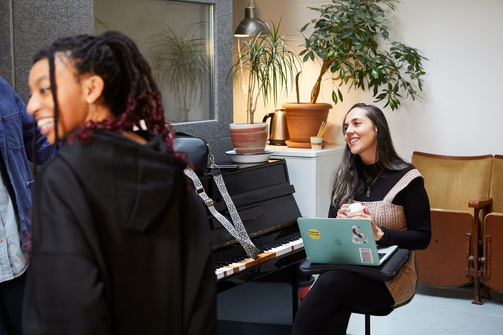 Teacher and students having fun in the studio at City Vocal Coach